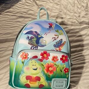 Loungefly Pixar mini Backpack - Light Blue and Red